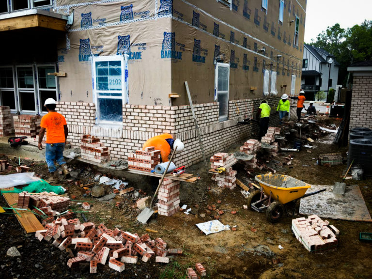 Brick installation on a commercial exterior