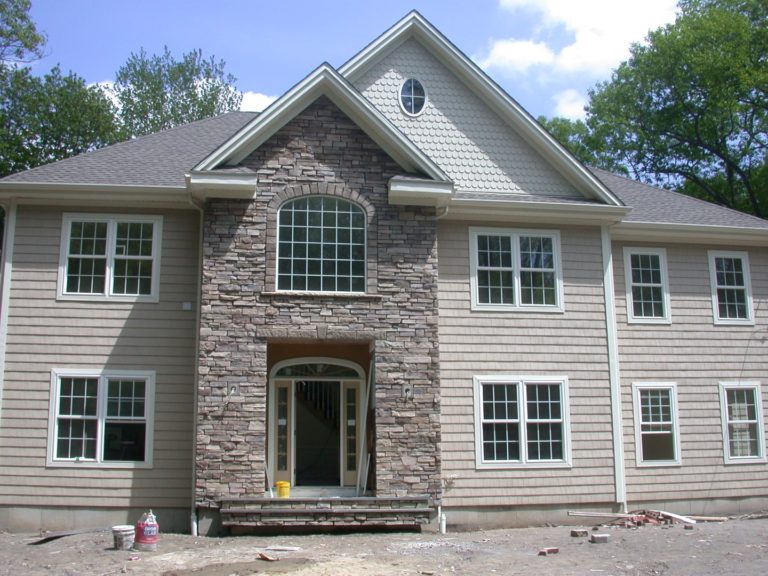 Stone entryway on a two-story home