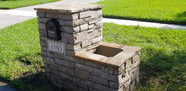 Custom stone mailbox with planter