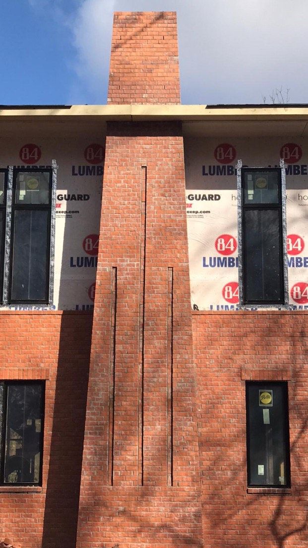Brick chimney on a home exterior